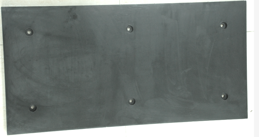 Studded rubber mat with anti-slip surface